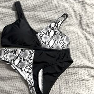 Half snake skin, half black bakini
